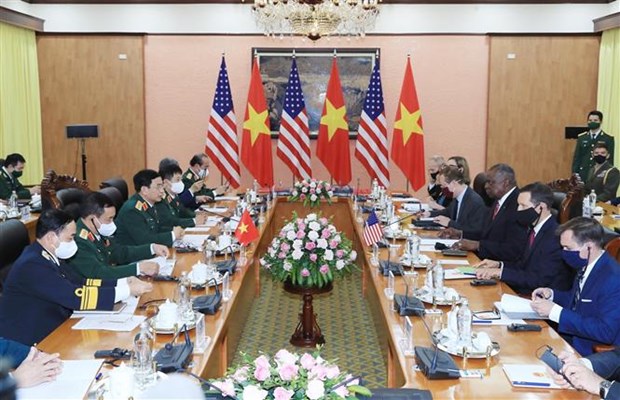 Defence Minister General Phan Van Giang hold talks with US Secretary of Defence Lloyd Austin hold talks in Hanoi (Photo: VNA)