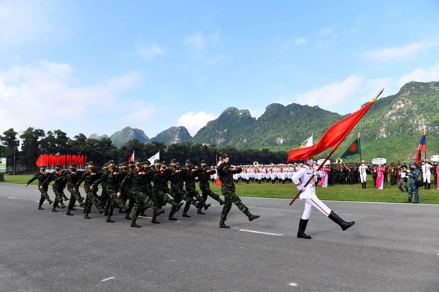 The Vietnamese team march at the contest opening ceremony in Hanoi on August 31 (Photo: qdnd.vn)