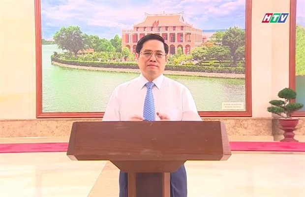 Prime Minister Pham Minh Chinh speaks at the event. (Photo: VNA)