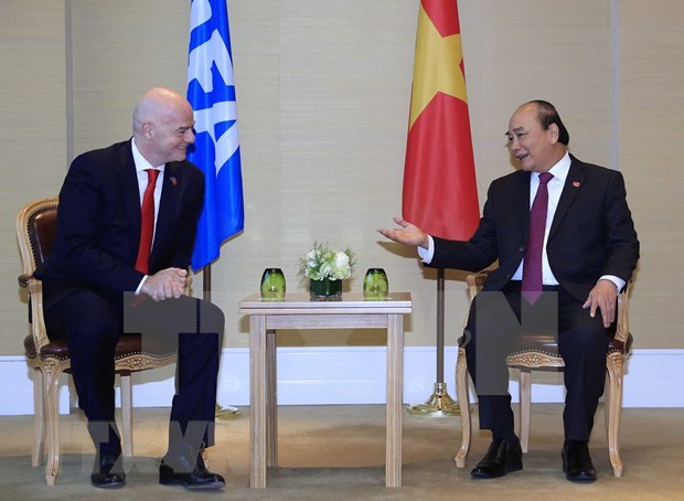 President Nguyen Xuan Phuc receives FIFA President Gianni Infantino(Photo: VNA)