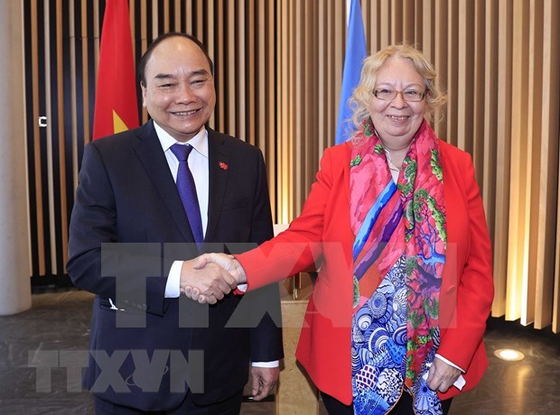 President Nguyen Xuan Phuc and Tatiana Valovaya, Director-General of the UN Office in Geneva (Photo: VNA)