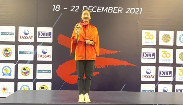 Hoang Thi My Tam poses with her gold medal in the Asian Karate Championships 2021. (Photo courtesy of Hoang Thi My Tam)