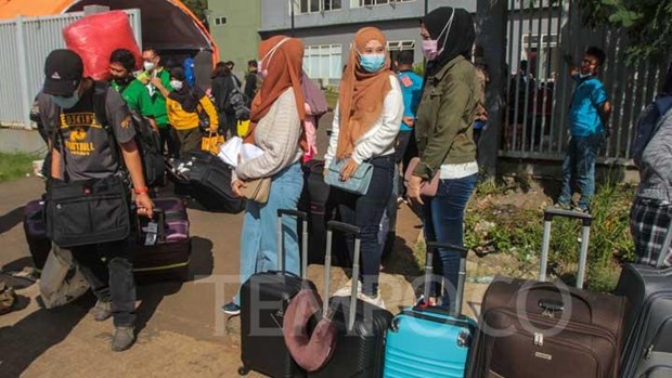 A number of Indonesian migrant workers in Jakarta complete COVID-19 quarantine period (Photo: Tempo.co)