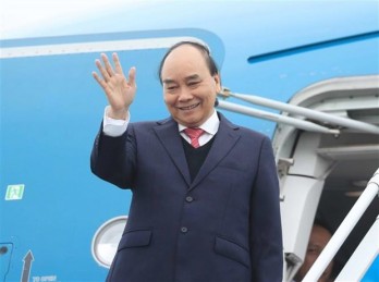 President leaves Hanoi for state visit to RoK