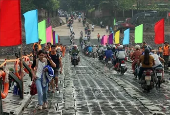 Pontoon bridge opened to traffic after Typhoon Yagi